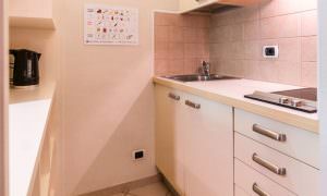 cucina appartamento per 3 persone Ambiez Residence Hotels